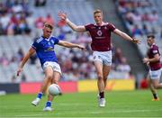 9 July 2022; Cian Madden of Cavan in action against Ray Connellan of Westmeath during the Tailteann Cup Final match between Cavan and Westmeath at Croke Park in Dublin. Photo by Ray McManus/Sportsfile