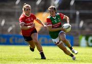 9 July 2022; Tamara O'Connor of Mayo in action against Libby Coppinger of Cork during the TG4 All-Ireland Ladies Football Senior Championship Quarter-Final match between Cork and Mayo at Cusack Park in Ennis, Clare. Photo by Matt Browne/Sportsfile