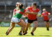 9 July 2022; Marie Ambrose of Cork in action against Tara Needham and Srarh Mulvihill of Mayo during the TG4 All-Ireland Ladies Football Senior Championship Quarter-Final match between Cork and Mayo at Cusack Park in Ennis, Clare. Photo by Matt Browne/Sportsfile