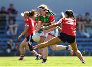 9 July 2022; Sinead Walsh of Mayo in action against Eimear Meaney of Cork during the TG4 All-Ireland Ladies Football Senior Championship Quarter-Final match between Cork and Mayo at Cusack Park in Ennis, Clare. Photo by Matt Browne/Sportsfile