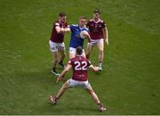 9 July 2022; Killian Clarke of Cavan in action against Westmeath players, left to right, James Dolan, Sam Duncan, and Jack Smith during the Tailteann Cup Final match between Cavan and Westmeath at Croke Park in Dublin. Photo by Daire Brennan/Sportsfile