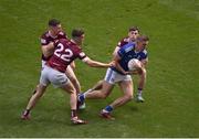 9 July 2022; Killian Clarke of Cavan in action against Westmeath players, left to right, James Dolan, Sam Duncan, and Jack Smith during the Tailteann Cup Final match between Cavan and Westmeath at Croke Park in Dublin. Photo by Daire Brennan/Sportsfile