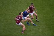 9 July 2022; Gearóid McKiernan of Cavan in action against Sam Duncan, left, and David Lynch of Westmeath during the Tailteann Cup Final match between Cavan and Westmeath at Croke Park in Dublin. Photo by Daire Brennan/Sportsfile