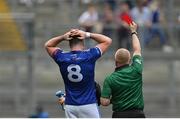 9 July 2022; Referee Barry Cassidy shows a red card to Thomas Galligan of Cavan during the Tailteann Cup Final match between Cavan and Westmeath at Croke Park in Dublin. Photo by Seb Daly/Sportsfile