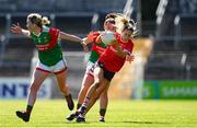 9 July 2022; Orla Finn of Cork in action against Fiona McHale and Kathryn Sullivan of Mayo during the TG4 All-Ireland Ladies Football Senior Championship Quarter-Final match between Cork and Mayo at Cusack Park in Ennis, Clare. Photo by Matt Browne/Sportsfile