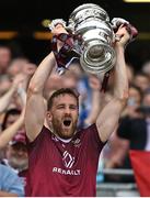9 July 2022; Westmeath captain Kevin Maguire lifts the Tailteann Cup after the Tailteann Cup Final match between Cavan and Westmeath at Croke Park in Dublin. Photo by Ramsey Cardy/Sportsfile