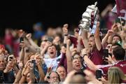 9 July 2022; Kevin Maguire of Westmeath lifts the cup after the Tailteann Cup Final match between Cavan and Westmeath at Croke Park in Dublin. Photo by Stephen McCarthy/Sportsfile