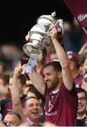 9 July 2022; Kevin Maguire of Westmeath lifts the cup after the Tailteann Cup Final match between Cavan and Westmeath at Croke Park in Dublin. Photo by Stephen McCarthy/Sportsfile