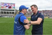 9 July 2022; Westmeath manager Jack Cooney, right, and Cavan manager Mickey Graham shake hands after the Tailteann Cup Final match between Cavan and Westmeath at Croke Park in Dublin. Photo by Seb Daly/Sportsfile
