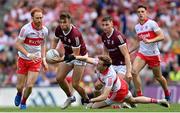 9 July 2022; Paul Conroy of Galway is tackled by Brendan Rogers of Derry during the GAA Football All-Ireland Senior Championship Semi-Final match between Derry and Galway at Croke Park in Dublin. Photo by Ramsey Cardy/Sportsfile