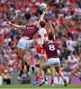 9 July 2022; Matthew Tierney, left, and Paul Conroy of Galway compete for the throw-in with Brendan Rogers, left, and Conor Glass of Derry during the GAA Football All-Ireland Senior Championship Semi-Final match between Derry and Galway at Croke Park in Dublin. Photo by Ramsey Cardy/Sportsfile