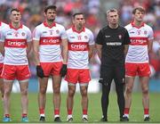 9 July 2022; Derry manager Rory Gallagher, with players, from left, Gareth McKinless, Christopher McKaigue, Benny Heron and Brendan Rogers before the GAA Football All-Ireland Senior Championship Semi-Final match between Derry and Galway at Croke Park in Dublin. Photo by Ramsey Cardy/Sportsfile