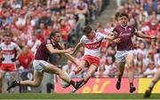 9 July 2022; Paul Cassidy of Derry has his shot at goal blocked by Kieran Molloy of Galway during the GAA Football All-Ireland Senior Championship Semi-Final match between Derry and Galway at Croke Park in Dublin. Photo by Seb Daly/Sportsfile