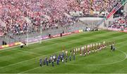 9 July 2022; The Galway and Derry teams parade behind the Artane School of Music Band ahead of the GAA Football All-Ireland Senior Championship Semi-Final match between Derry and Galway at Croke Park in Dublin. Photo by Daire Brennan/Sportsfile