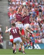 9 July 2022; Cillian McDaid, left, and Patrick Kelly of Galway in action against Benny Heron and Gareth McKinless of Derry during the GAA Football All-Ireland Senior Championship Semi-Final match between Derry and Galway at Croke Park in Dublin. Photo by Ramsey Cardy/Sportsfile