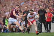 9 July 2022; Niall Loughlin of Derry in action against Matthew Tierney of Galway during the GAA Football All-Ireland Senior Championship Semi-Final match between Derry and Galway at Croke Park in Dublin. Photo by Ramsey Cardy/Sportsfile