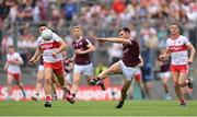 9 July 2022; Liam Silke of Galway passes to Damien Comer in the build up to their second goal during the GAA Football All-Ireland Senior Championship Semi-Final match between Derry and Galway at Croke Park in Dublin. Photo by Stephen McCarthy/Sportsfile