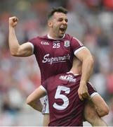 9 July 2022; Dylan McHugh, 5, and Dessie Conneely of Galway celebrate at the final whistle of the GAA Football All-Ireland Senior Championship Semi-Final match between Derry and Galway at Croke Park in Dublin. Photo by Ramsey Cardy/Sportsfile