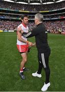 9 July 2022; Galway manager Padraic Joyce and Christopher McKaigue of Derry after the GAA Football All-Ireland Senior Championship Semi-Final match between Derry and Galway at Croke Park in Dublin. Photo by Seb Daly/Sportsfile