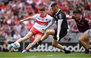 9 July 2022; Lachlan Murray of Derry shoots past Galway goalkeeper Connor Gleeson and full back Seán Kelly to score a goal, in the 74th minute,  during the GAA Football All-Ireland Senior Championship Semi-Final match between Derry and Galway at Croke Park in Dublin. Photo by Ray McManus/Sportsfile