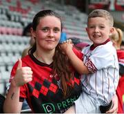 9 July 2022; Lisa Murphy of Bohemians with her son Jackson, age 5, after the EVOKE.ie FAI Women's Cup First Round match between Bohemians and Galway WFC at Dalymount Park in Dublin. Photo by Michael P Ryan/Sportsfile
