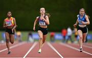 9 July 2022; Megan Lynch of Lios Tuathail AC, Kerry, centre, on her way to winning the under 19 girls 100m during day two of the Irish Life Health National Juvenile Track and Field Championships at Tullamore Harriers Stadium in Tullamore, Offaly. Photo by Sam Barnes/Sportsfile