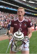 9 July 2022; Ray Connellan of Westmeath celebrates with the trophy after his side's victory in the Tailteann Cup Final match between Cavan and Westmeath at Croke Park in Dublin. Photo by Seb Daly/Sportsfile