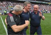 9 July 2022; Westmeath manager Jack Cooney, centre, celebrates with kitmen Shane Maher and Paddy Walsh after their side's victory in the Tailteann Cup Final match between Cavan and Westmeath at Croke Park in Dublin. Photo by Seb Daly/Sportsfile