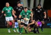 9 July 2022; Peter O’Mahony of Ireland breaks past the challenge of Aidan Ross of New Zealand during the Steinlager Series match between the New Zealand and Ireland at the Forsyth Barr Stadium in Dunedin, New Zealand. Photo by Brendan Moran/Sportsfile