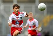 9 July 2022; Ken Irwin, Saint Lorcan's Boy's N.S., Palmerstown, Dublin, representing Derry, during the INTO Cumann na mBunscol GAA Respect Exhibition Go Games at half-time of the GAA Football All-Ireland Senior Championship Semi-Final match between Galway and Derry at Croke Park in Dublin. Photo by Stephen McCarthy/Sportsfile