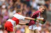 9 July 2022; Francis Óg McTiernan, St. Caillin's N.S., Fenagh, Leitrim, representing Galway, and Pádraig Donaghy, Blessed Patrick O'Loughran P.S., Castlecaulfield, Dungannon, Tyrone, representing Derry, during the INTO Cumann na mBunscol GAA Respect Exhibition Go Games at half-time of the GAA Football All-Ireland Senior Championship Semi-Final match between Galway and Derry at Croke Park in Dublin. Photo by Stephen McCarthy/Sportsfile