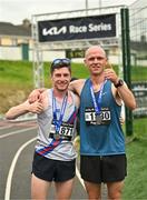 10 July 2022; Paul O'Donnell, Dundrum South Dublin AC, first place, left, and William Maunsell, Clonmel AC, second place, after the Kia Race Series Edenderry 10 Mile race in Edenderry in Offaly. Photo by Diarmuid Greene/Sportsfile