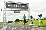 10 July 2022; Niall Delaney of Donadea Running Club crosses the finish line at the Kia Race Series Edenderry 10 Mile race in Edenderry in Offaly. Photo by Diarmuid Greene/Sportsfile
