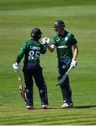 10 July 2022; Harry Tector of Ireland, right, is congratulated by teammate Curtis Campher after bringing up his half century during the Men's One Day International match between Ireland and New Zealand at Malahide Cricket Club in Dublin. Photo by Seb Daly/Sportsfile