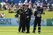 10 July 2022; Glenn Phillips of New Zealand, left, celebrates with teammates after claiming the wicket of Ireland's Curtis Campher during the Men's One Day International match between Ireland and New Zealand at Malahide Cricket Club in Dublin. Photo by Seb Daly/Sportsfile
