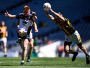 10 July 2022; Tiernan Mathers of New York shoots under pressure from Shane Kelly of Kilkenny during the GAA Football All-Ireland Junior Championship Final match between Kilkenny and New York at Croke Park in Dublin. Photo by Piaras Ó Mídheach/Sportsfile