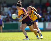10 July 2022; Catriona Murray of Wexford in action against Rachel Fitzmaurice of Roscommon during the TG4 All-Ireland Ladies Football Intermediate Championship Semi-Final match between Roscommon and Wexford at Crettyard GAA club, Crettyard, Laois. Photo by Michael P Ryan/Sportsfile