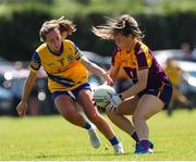 10 July 2022; Aisling Murphy of Wexford in action against Rachel Fitzmaurice of Roscommon during the TG4 All-Ireland Ladies Football Intermediate Championship Semi-Final match between Roscommon and Wexford at Crettyard GAA club, Crettyard, Laois. Photo by Michael P Ryan/Sportsfile