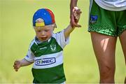 10 July 2022; Alva Quaid of Limerick leaves the field holding hands with her son Michael, age 1, after her side's defeat in the TG4 All-Ireland Ladies Football Junior Championship Semi-Final match between Fermanagh and Limerick at St Brigid’s GAA club in Kiltoom, Roscommon. Photo by David Fitzgerald/Sportsfile