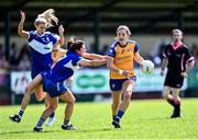 10 July 2022; Niamh O'Dea of Clare in action against Clodagh Dunne of Laois during the TG4 All-Ireland Ladies Football Intermediate Championship Semi-Final match between Clare and Laois at St Brigid’s GAA club in Kiltoom, Roscommon. Photo by David Fitzgerald/Sportsfile