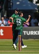 10 July 2022; Curtis Campher of Ireland, 35, celebrates after claiming the wicket of New Zealand's Henry Nicholls during the Men's One Day International match between Ireland and New Zealand at Malahide Cricket Club in Dublin. Photo by Seb Daly/Sportsfile
