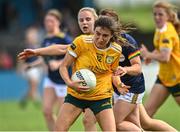 10 July 2022; Maria O'Neill of Antrim in action against Antoinette Dowling and Ruth Bermingham of Carlow during the TG4 All-Ireland Ladies Football Junior Championship Semi-Final match between Antrim and Carlow at Lann Léire GAA club in Dunleer, Louth. Photo by Oliver McVeigh/Sportsfile