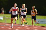 10 July 2022; Evan Moran of Galway City Harriers AC, left, on his way to winning the under 17 boys 300m from Ruaidhri Boyle of Carraig-Na-Bhfear AC, Cork, centre, and Cormac Crotty of Annalee AC, Cavan, during day three of the Irish Life Health National Juvenile Track and Field Championships at Tullamore Harriers Stadium in Tullamore, Offaly. Photo by Diarmuid Greene/Sportsfile
