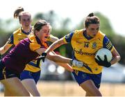 10 July 2022; Natalie McHugh of Roscommon in action against Aisling Halligan of Wexford during the TG4 All-Ireland Ladies Football Intermediate Championship Semi-Final match between Roscommon and Wexford at Crettyard GAA club, Crettyard, Laois. Photo by Michael P Ryan/Sportsfile