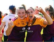 10 July 2022; Wexford players Amy Wilson, left, and Cathy O'Brien celebrate after the TG4 All-Ireland Ladies Football Intermediate Championship Semi-Final match between Roscommon and Wexford at Crettyard GAA club, Crettyard, Laois. Photo by Michael P Ryan/Sportsfile