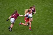 9 July 2022; Neveah Dowds, St. Brigid's P.S., Ballymena, Antrim, representing Derry, in action against Saoirse Murray, Craggagh N.S., Kiltimagh, Mayo, left, and Sian Bolger, St Brendans N.S., Muckalee, Kilkenny, representing Galway, representing Galway, during the INTO Cumann na mBunscol GAA Respect Exhibition Go Games before the GAA Football All-Ireland Senior Championship Semi-Final match between Galway and Derry at Croke Park in Dublin. Photo by Daire Brennan/Sportsfile