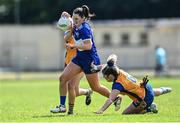 10 July 2022; Erone Fitzpatrick of Laois in action against Laurie Ryan of Clare during the TG4 All-Ireland Ladies Football Intermediate Championship Semi-Final match between Clare and Laois at St Brigid’s GAA club in Kiltoom, Roscommon. Photo by David Fitzgerald/Sportsfile