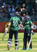 10 July 2022; Ireland batsmen Simi Singh, right, and George Dockrell during the Men's One Day International match between Ireland and New Zealand at Malahide Cricket Club in Dublin. Photo by Seb Daly/Sportsfile