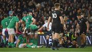 9 July 2022; Garry Ringrose of Ireland, left, and Ofa Tu'ungafasi of New Zealand lie injured after a clash of heads, for which Ofa Tu'ungafasi was shown a red card, during the Steinlager Series match between the New Zealand and Ireland at the Forsyth Barr Stadium in Dunedin, New Zealand. Photo by Brendan Moran/Sportsfile