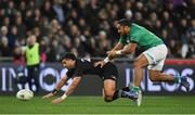 9 July 2022; Richie Mo'unga of New Zealand is tackled by Bundee Aki of Ireland during the Steinlager Series match between the New Zealand and Ireland at the Forsyth Barr Stadium in Dunedin, New Zealand. Photo by Brendan Moran/Sportsfile